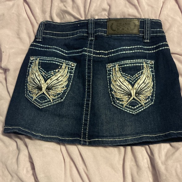 low rise/mid rise mini skirt and size 3/4. I honestly forgot what the price was. - Picture 2 of 3